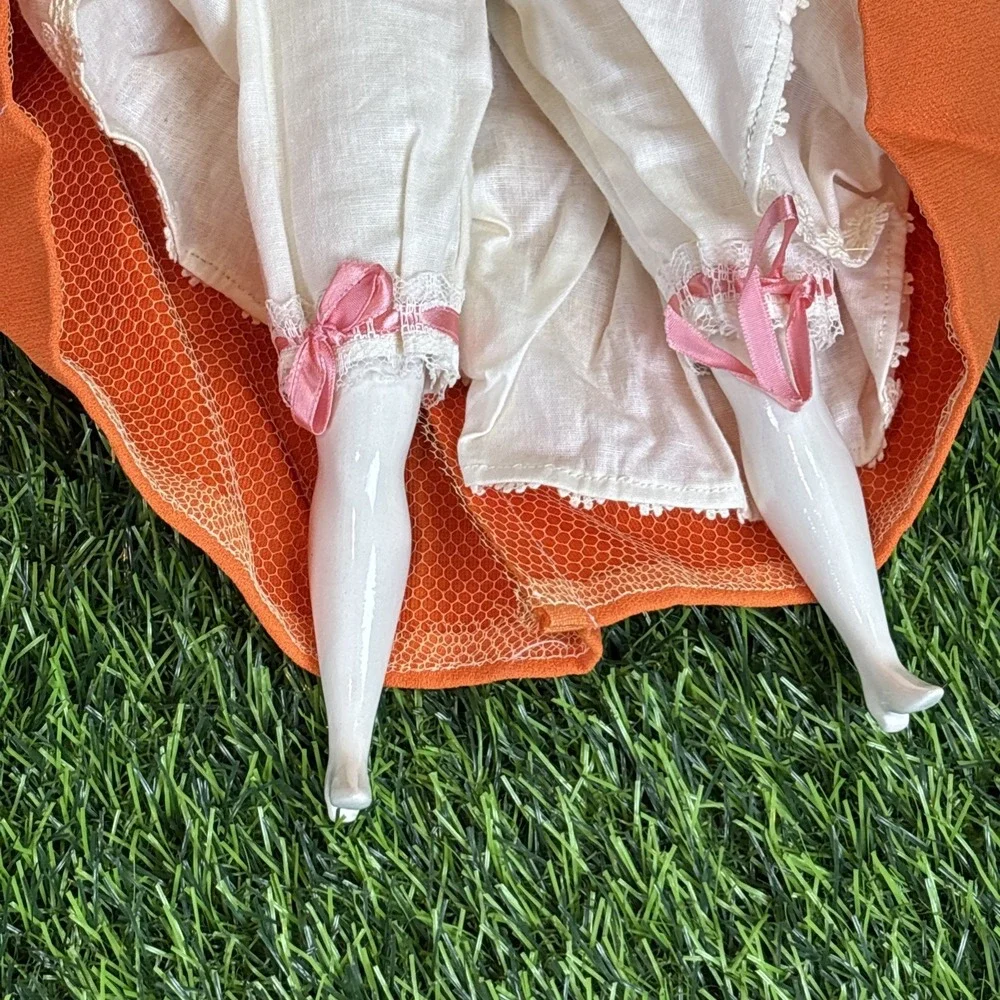 Vintage German Porcelain Doll‎ Orange Dress Hand Painted Face AS IS